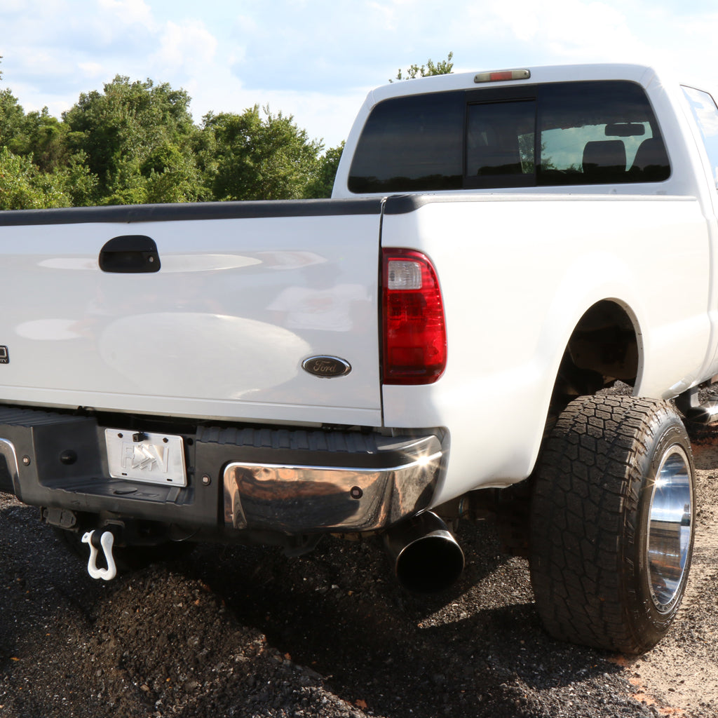 2008 Ford F250 lifted with a pure white moose knuckle shackle mounted on the rear bumper hitch shackle receiver