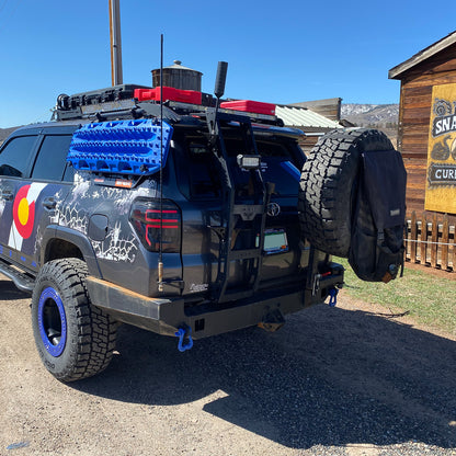 Blue shackles on a Toyota 4runner overlanding 4x4 custom rear bumper shackle mounts | Moose Knuckle Offroad recovery gear