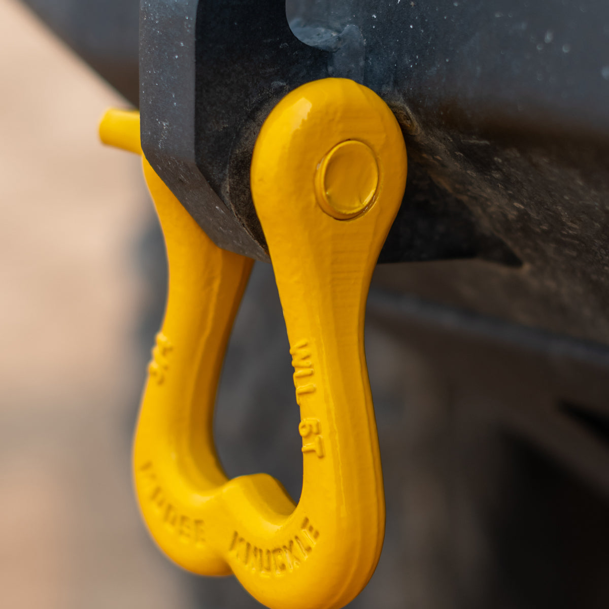 Yellow Jeep truck shackle on a custom rear bumper | Moose Knuckle Offroad