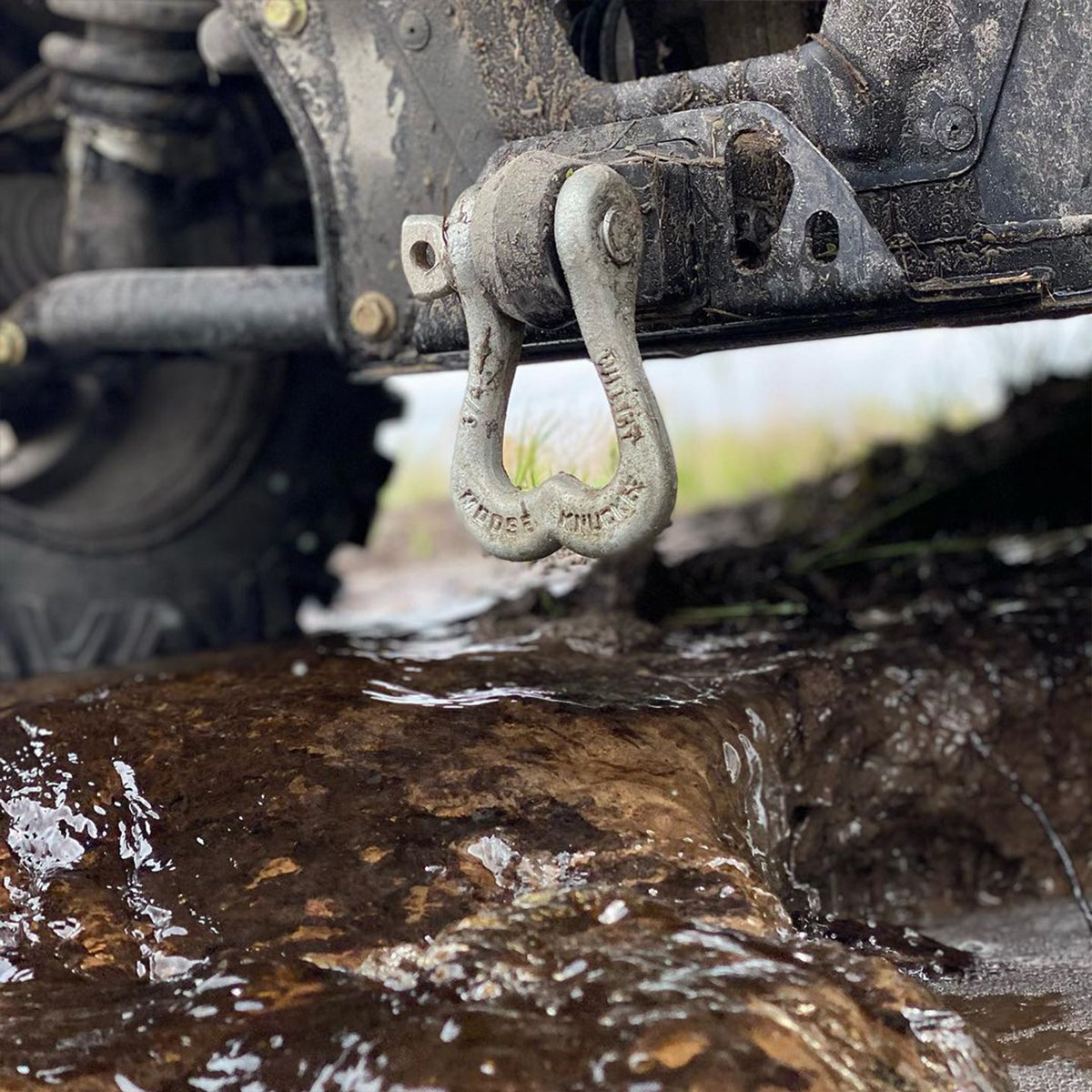 Dirty Galvanized Tow Shackle on the soft shackle hitch receiver of CanAm side by side SxS UTV | Moose Knuckle Offroad