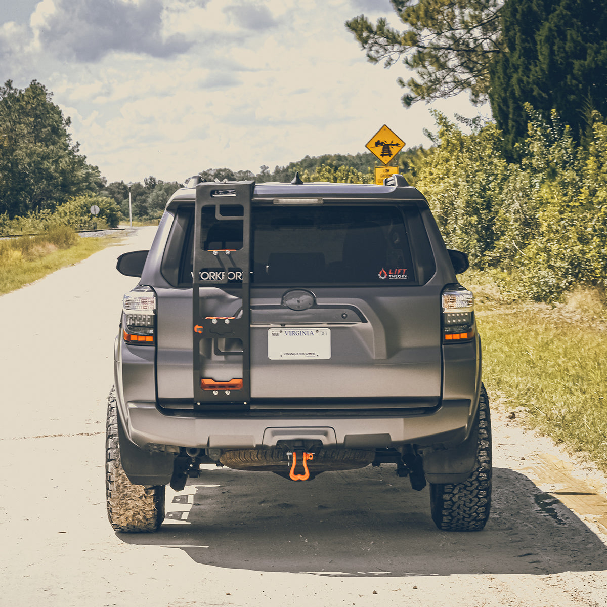 Orange Truck Nuts Shackle on the back hitch receiver of a Toyota 4 Runner | Moose Knuckle Offroad Shackles