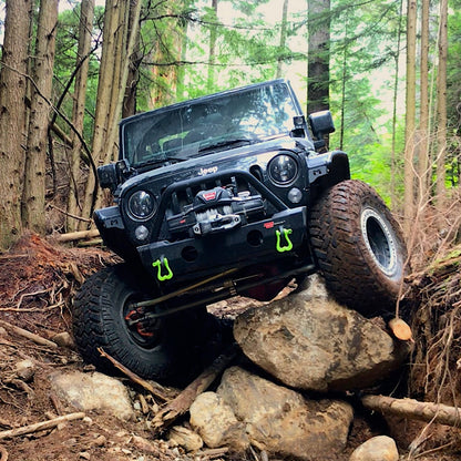 Moose Knuckle Offroad recovery shackles on bumper of Jeep Wrangler overlanding